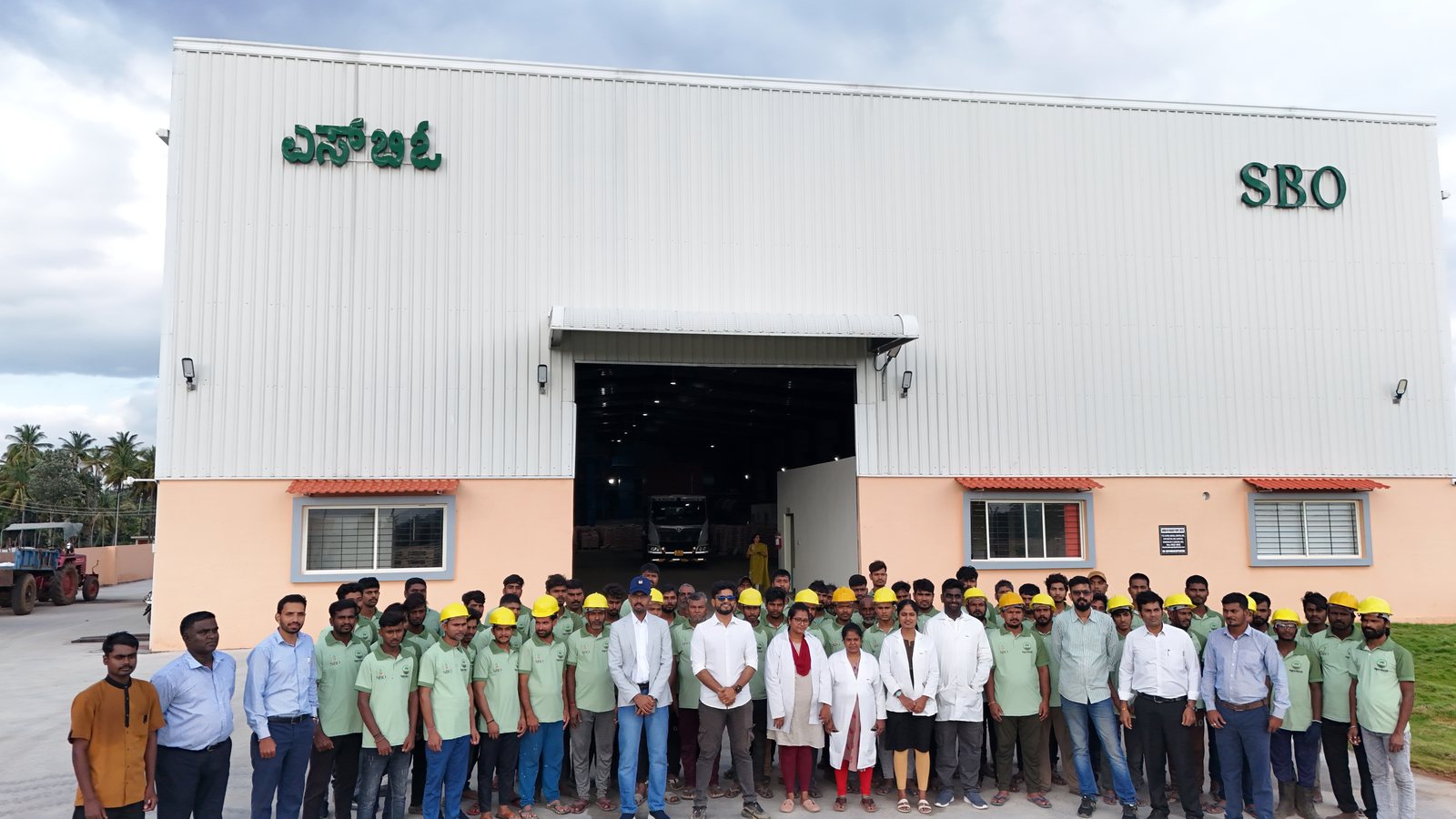 The full Shrestha Bio Organics team outside the facility